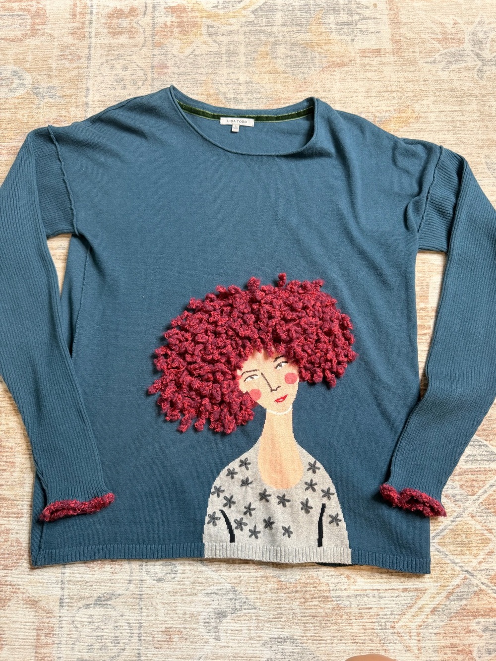 Lisa Todd Teal Sweater with Red Appliqué Hair